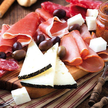 "plate of cut meats and cheeses" under Public Domain